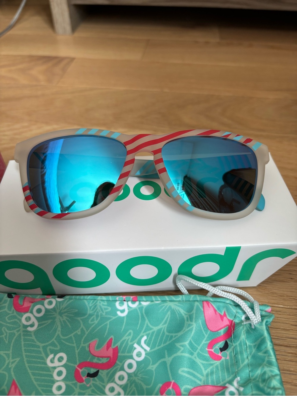 Goodr Sunglasses - Blue Mirror Lenses with Cream & Red Striped Frame